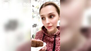 Blond girl's first time taking a big bite