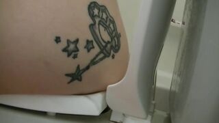 Tattooed girl toilet explosion