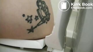 Tattooed girl toilet explosion