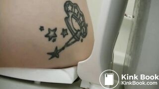 Tattooed girl toilet explosion