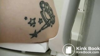 Tattooed girl toilet explosion