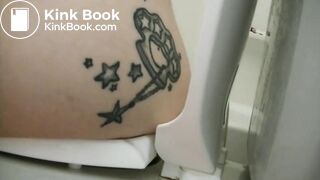 Tattooed girl toilet explosion
