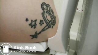 Tattooed girl toilet explosion