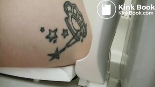 Tattooed girl toilet explosion