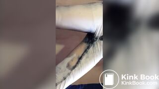 Filling her jeans with piss and shit, very messy