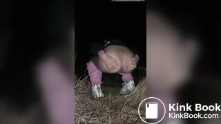 Young blonde poops outdoors at night
