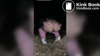 Young blonde poops outdoors at night