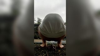 Female is diarrhea in the street