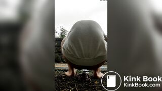 Female is diarrhea in the street