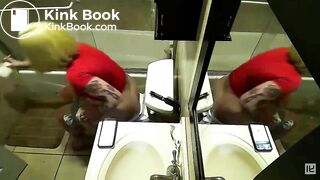 2 women pooping with reflections in a mirror