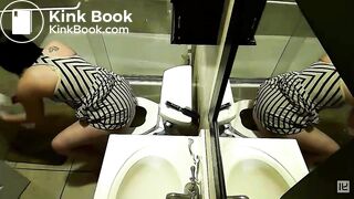 2 women pooping with reflections in a mirror