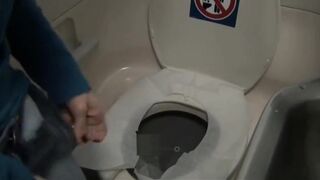 Pooping in a plane toilet