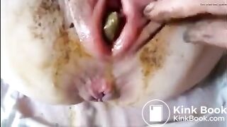 A poo in her vagina..