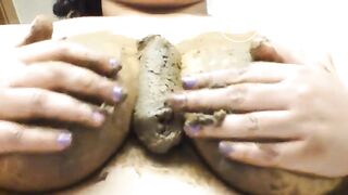 Smearing poo on her big nipple tits..