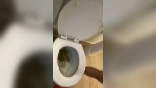 Little thoty dropping a nice one in the toilet