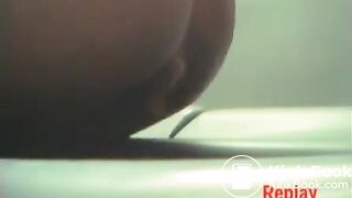 Woman uses festival porta-potty to poop