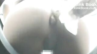 Woman uses festival porta-potty to poop