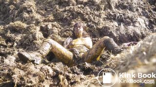 Watched on the dunghill - girl covered in cowshit