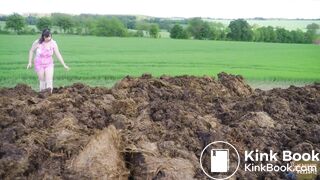 Watched on the dunghill - girl covered in cowshit