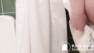 Topless diaper girl messes while wearing shorts