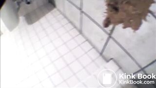 Girl shit on the floor in a public toilet