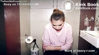 Pregnant Woman Pooping on the Toilet