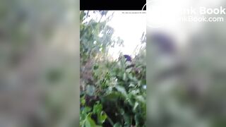 Girl pooping in bush