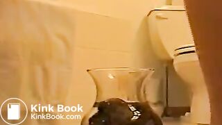 A poo in a water bowl..