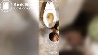 Two women shitting in public toilet