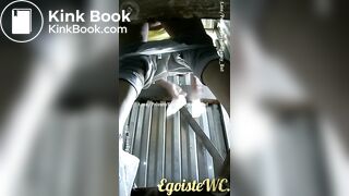 Scat voyeur in an outside toilet