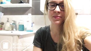 Blonde Beauty pooping in the toilet