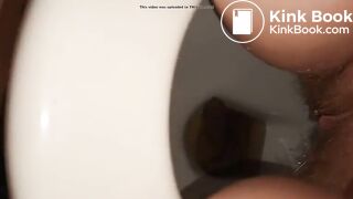 Girl with hairy pussy poops filmed between the legs