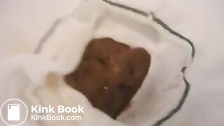 Relieving herself in her white undies..