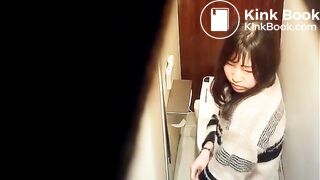 The girl is having a hard time with constipation.