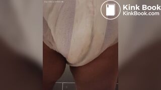 Diaper poop in wet diaper