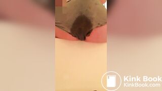 A poo in her grey undies..