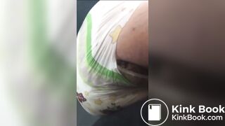 sexy girl shitting a lot in her diaper