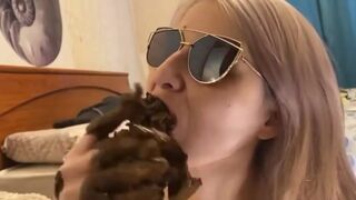 Blonde woman chewing her shit