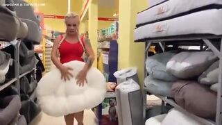 Cheeky milf blonde pooping in a store
