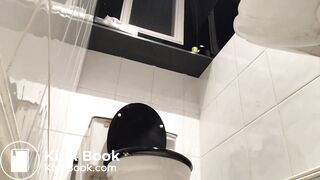 Sexy blonde girl pooping and farting on toilet