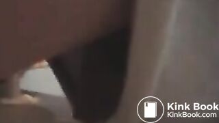 Messing her white undies above the toilet..