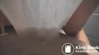 Messing her white undies above the toilet..