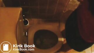 Carolina pooping whilst reading magazine