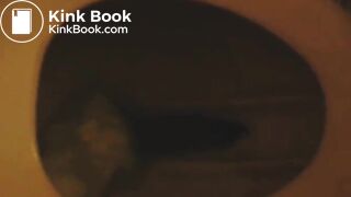 Carolina pooping whilst reading magazine