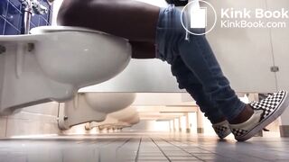 Ebony girl pooping and farting on public toilet