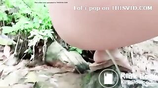 Asian Beauty - pooping in the river