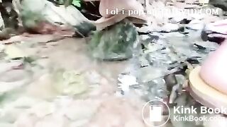 Asian Beauty - pooping in the river