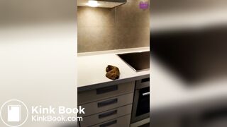 Girl shits on kitchen counter