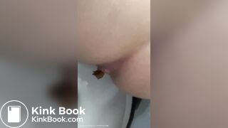 Sexy girl shits in the toilet