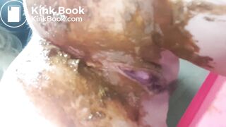 Pink panties overflowing with soft poop